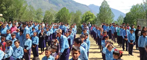 Nepali students do morning exercises. 